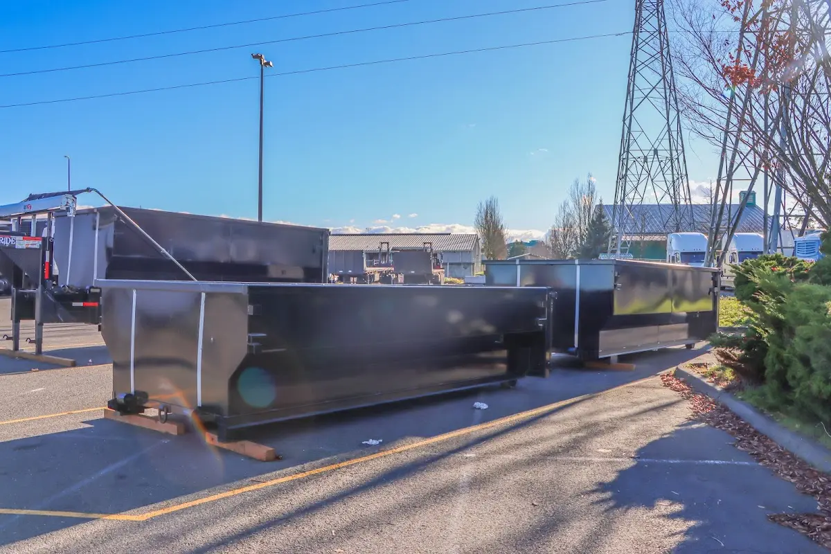 Roll-off dumpster ready for waste disposal at job site for Construction Dumpster Rental in Derby